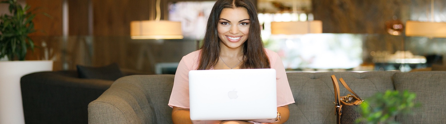 two people fitting four large puzzle pieces together